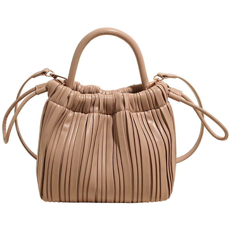 2025 otoño y invierno nuevo bolso plegable bolso de cubo de cuerda de tracción universal bolso de hombro de moda de mujer bolso de viaje