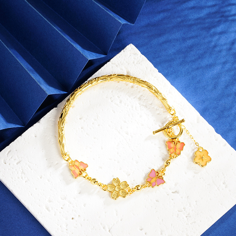 Nuevo estilo chino vietnamita arena oro mariposa flor pulsera no se desvanece durante mucho tiempo versátil retro alta sensación de joyería brazalete suministro