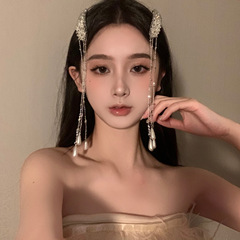 真珠のフリンジピンの新しい中国式の小さい大衆の民族の風の頭は側の前髪を飾ってカードの女性の2025新型を挟みます。