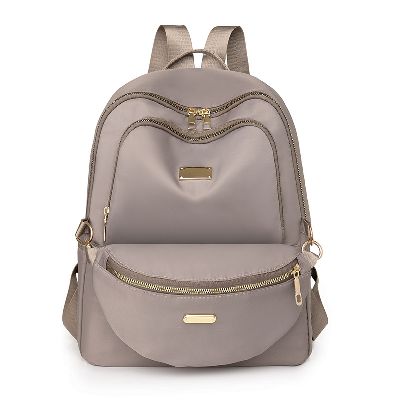 Fábrica al por mayor 2024 nueva mochila de nailon casual para mujer, mochila para madre y niño de viaje urbano de todo fósforo de moda