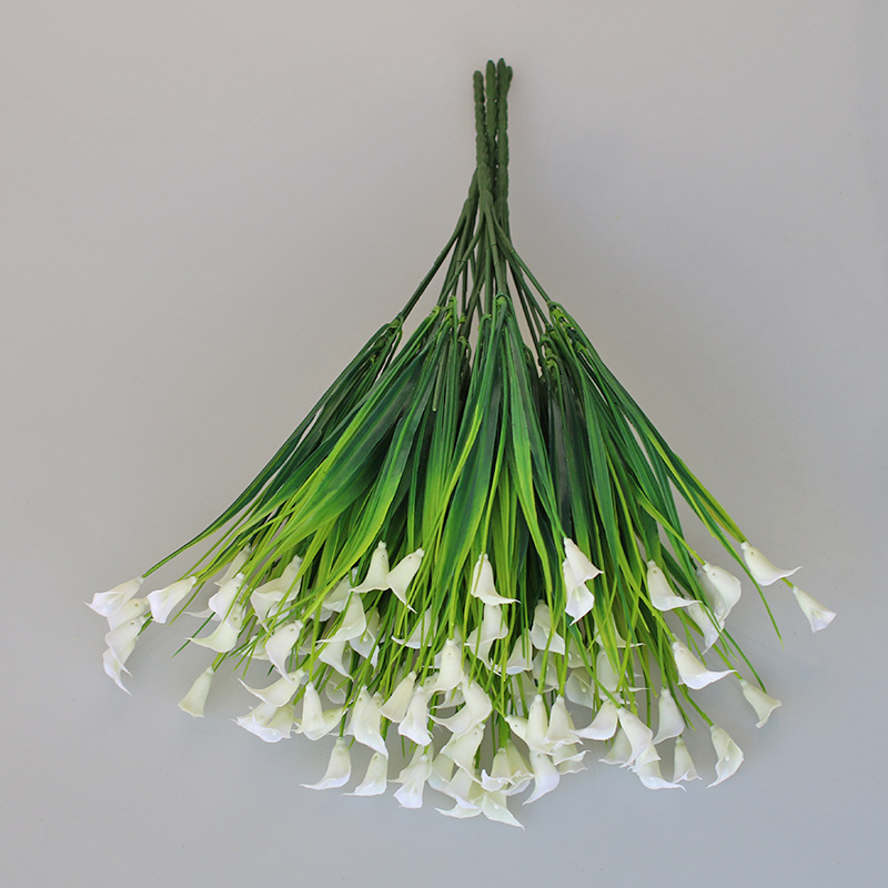 Venta al por mayor Mini simulación estrellado flor artificial planta verde bonsai planta decorativa pequeña flor de plástico sola planta de agua pequeño altavoz