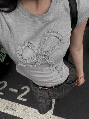 A women's short-sleeve round-neck T-shirt with a pure cotton bow tie element, 210g, 40 pieces, suitable for daily wear.