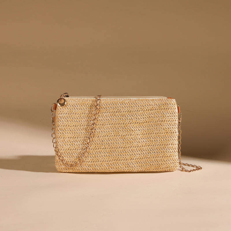 Spot primavera y verano nuevas señoras, cadena minimalista, pequeño bolso cuadrado, ocio, simple, elementos de paja, bolso de mensajero de un solo hombro para teléfono móvil