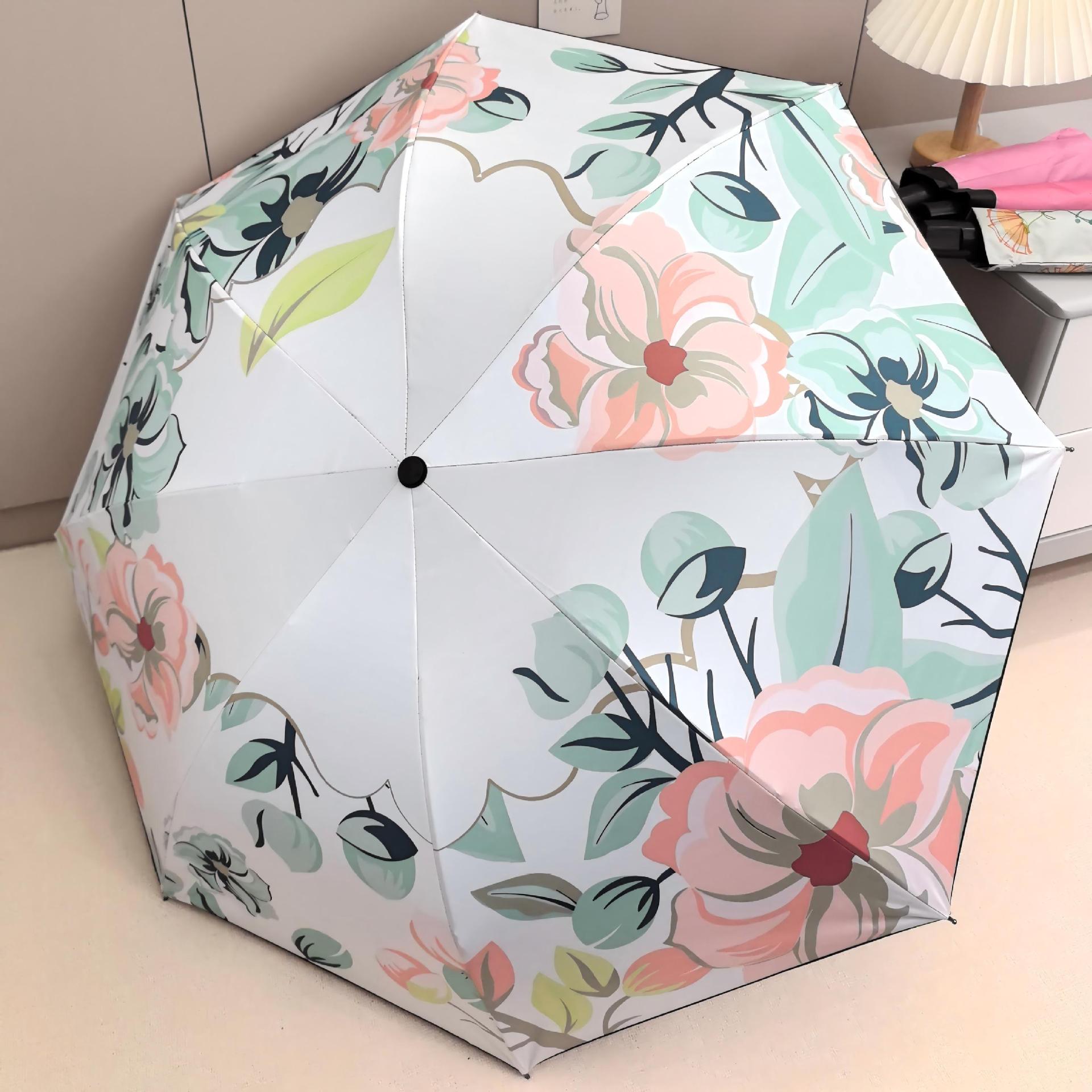 Sombrilla, de doble propósito para sol y lluvia, serie de flores, sombrilla plegable con revestimiento negro para protección solar.