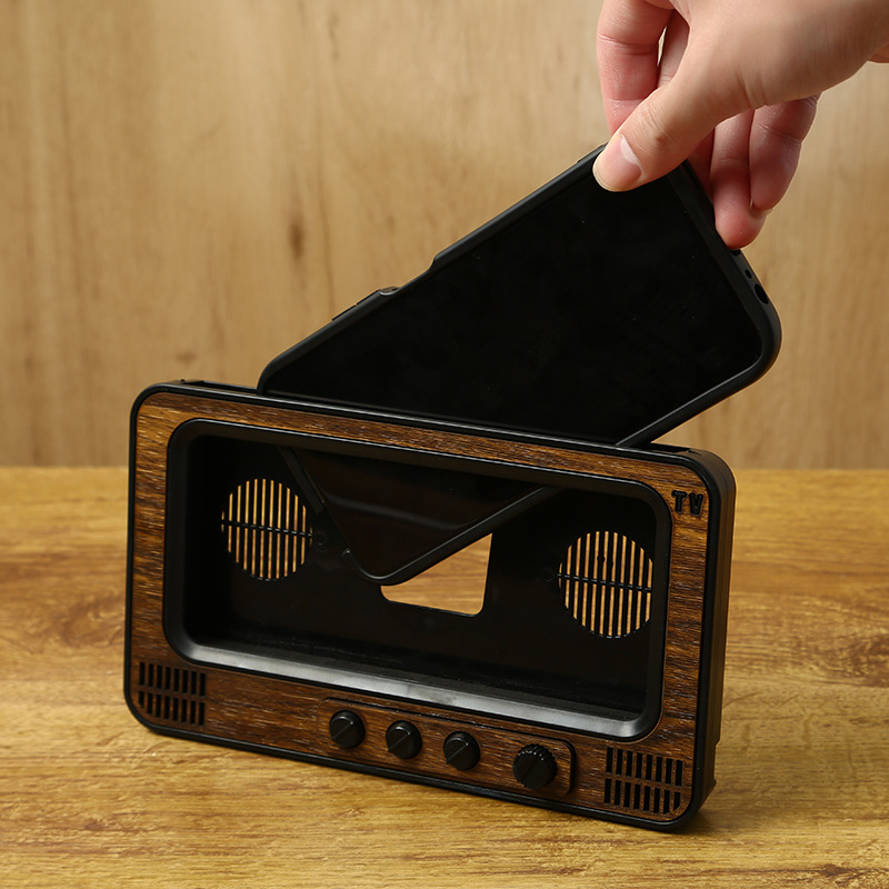 Nuevo soporte de teléfono móvil de escritorio de TV transfronterizo, altavoz de TV retro, soporte perezoso, soporte de teléfono móvil de audio Bluetooth creativo