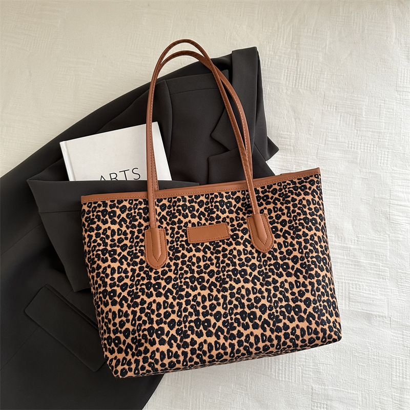 2024 en línea caño invierno nuevo retro leopardo bolso de lona bolso de hombro de niñas bolso de mano casual de gran capacidad