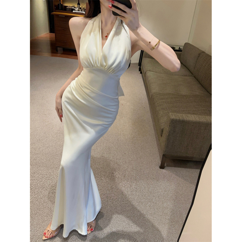 Real Shot of a French-Style Satin V-Neck Halter Dress with a Pure and Alluring Vibe, Featuring a Cinched Waist and Bodycon Fit, Long Length Real Shot of a French-Style Satin V-Neck Halter Dress with a Pure and Alluring Vibe, Featuring a Cinched Waist and Bodycon Fit, Long Length