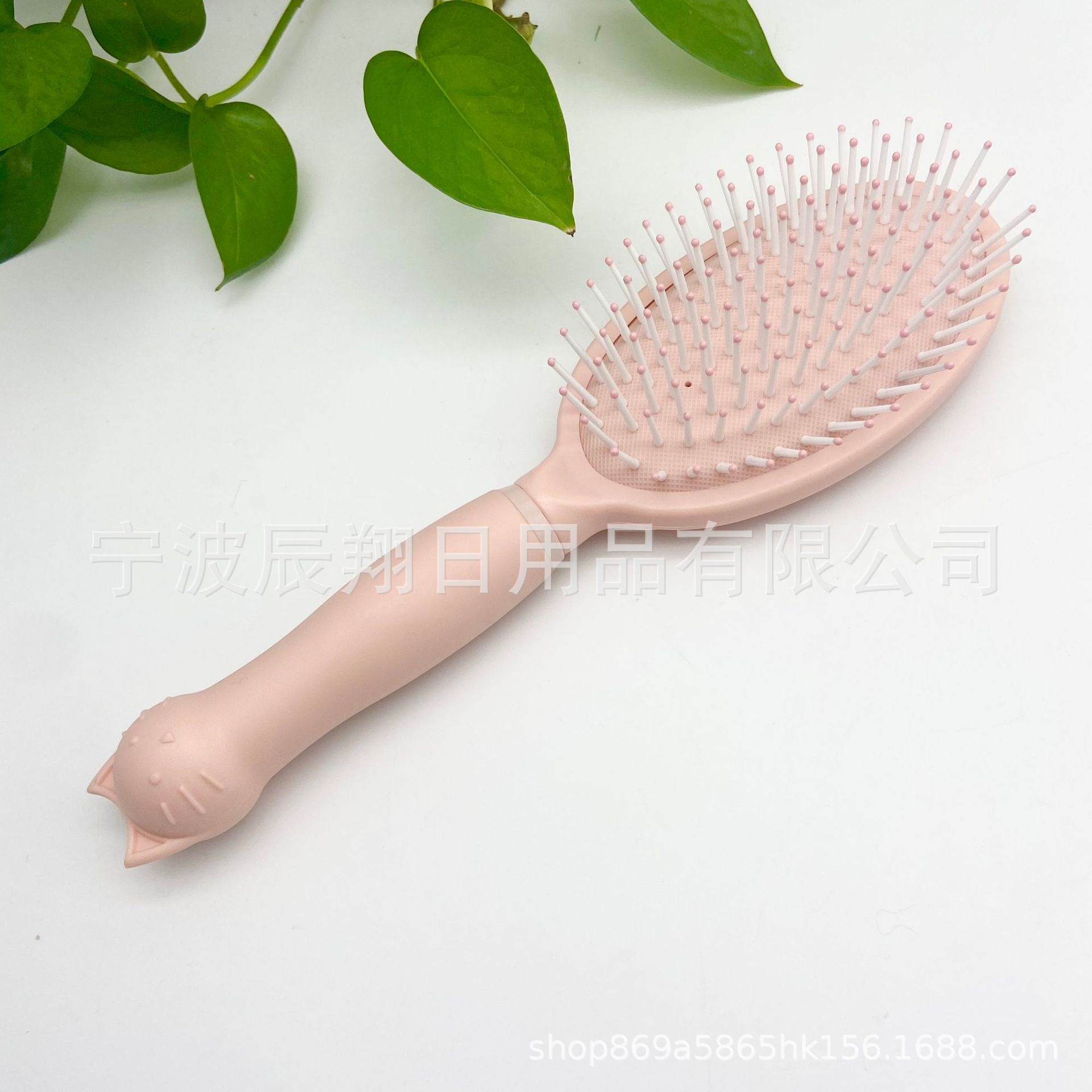 粉色椭圆气垫梳