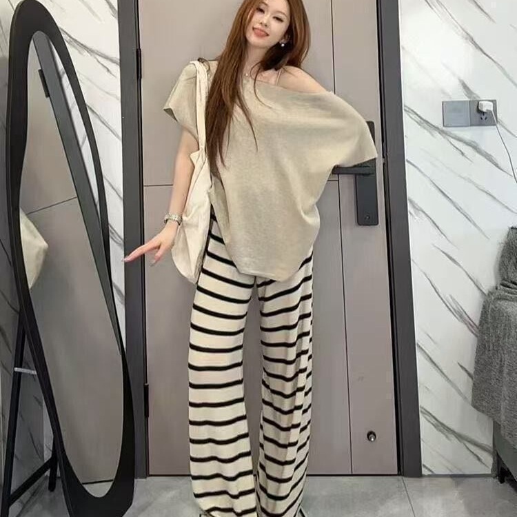 Summer Korean-style women's outfit: loose-fitting off-shoulder short-sleeve knit top with bat sleeves and slim striped wide-leg pants set Summer Korean-style women's outfit: loose-fitting off-shoulder short-sleeve knit top with bat sleeves and slim striped wide-leg pants set