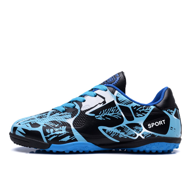 Zapatos de fútbol de clavos largos transfronterizos para niños al aire libre primavera y verano para estudiantes de primaria y secundaria zapatos de entrenamiento deportivo de clavos al por mayor
