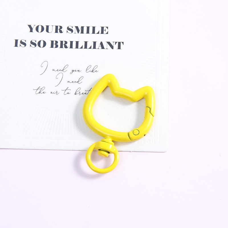 [yellow] cat head spring buckle