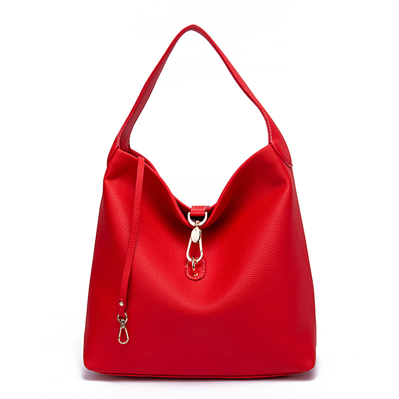 Neue handgehaltene Damen-Tasche mit körnigem Kieselmuster und einer Schulter unter dem Arm_voghion.com