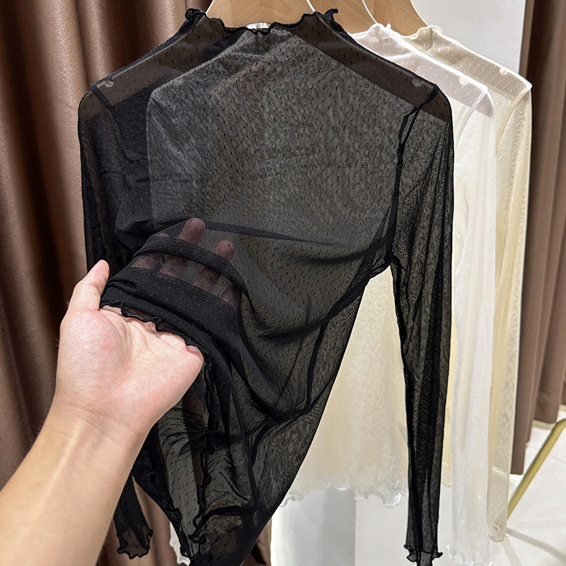 半高襟レースの底のシャツの女性の春と秋の空気の中に透明な網の紗の長袖の紗の服の木の耳元の薄い紗の上着を掛けます。|undefined