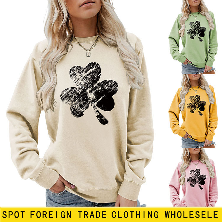 Amazon ebay fashion trend women's temperament hollow clover black and white crew neck long sleeve shirt sports sweater