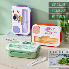 かわいいアニメの小学生の弁当箱は食器の恐竜を持っています。