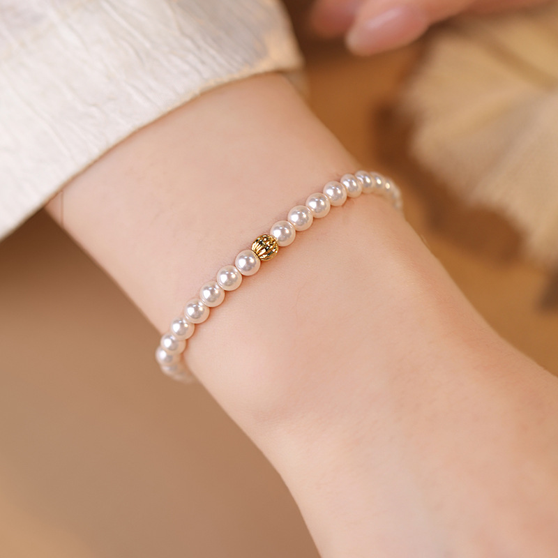 SKU_1_4mm珍珠手链 车花金珠.jpg