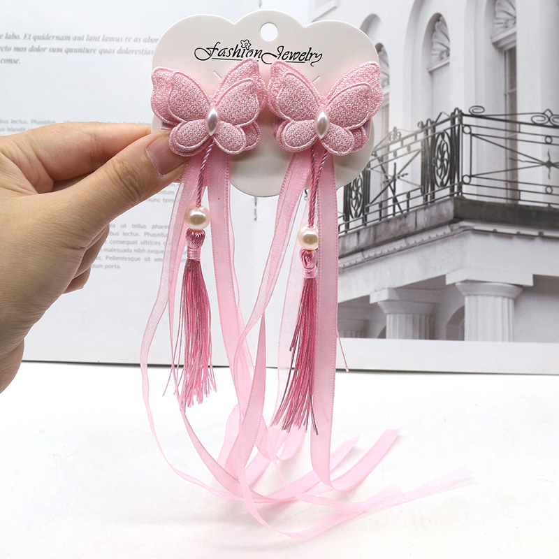 Children's hair accessory with tassels