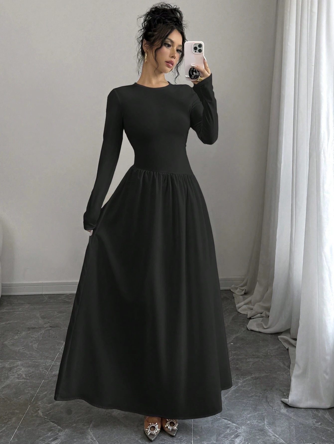 Fashionable elegant black long-sleeve with a round collar