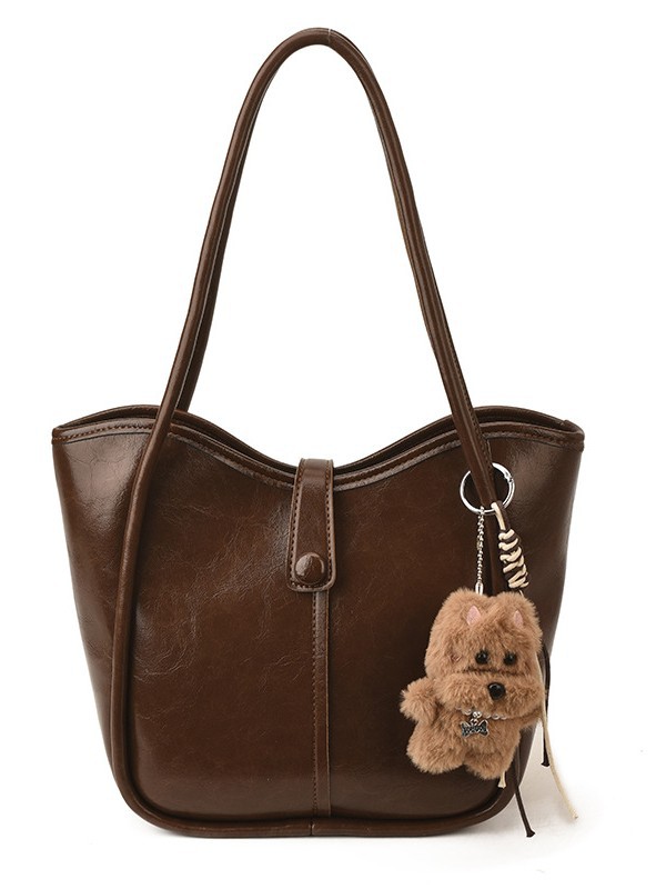 Este año, la moda simple bolso de cubo de mujer venta caliente nueva textura de alta calidad retro versátil lujo ligero bolso de hombro
