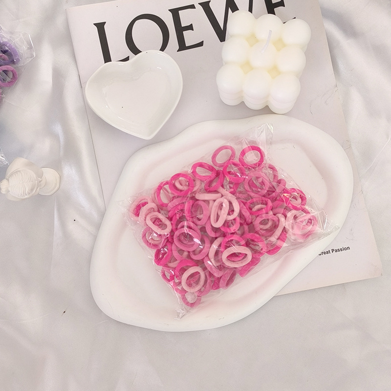 Solo al por mayor cuerda de pelo negro banda de pelo femenino estilo coreano alta elasticidad no duele el pelo banda de goma corbata alta Cola de Caballo accesorios para el cabello del bebé