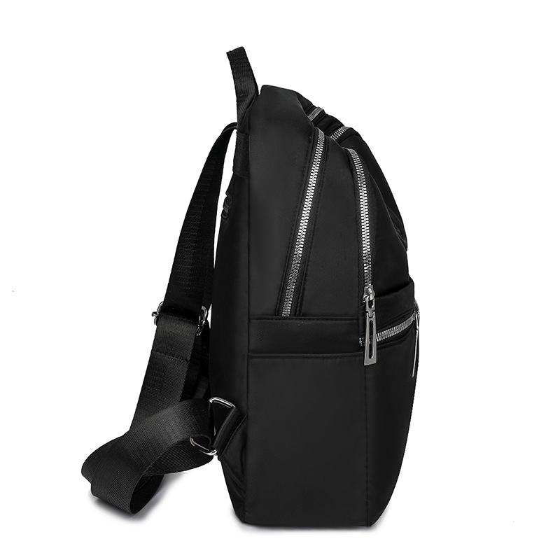 2025 nueva mochila de nailon casual para mujer, mochila de viaje al aire libre de gran capacidad en relieve de moda, mochila escolar para estudiantes