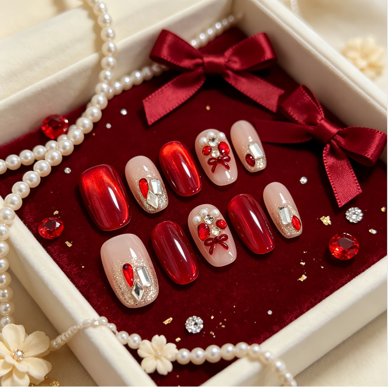 Wine red cat-eye gradient nail tips with diamonds and gold foil, pure desire style, hot red, cute, flattering, short wearable nails Wine red cat-eye gradient nail tips with diamonds and gold foil, pure desire style, hot red, cute, flattering, short wearable nails