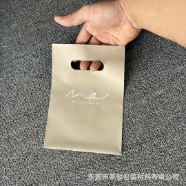 服装手提塑料袋四指袋印花购物塑料袋广告宣传服装购物袋可加印