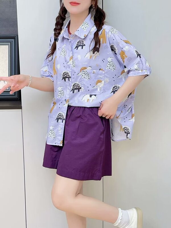 Korean version of the new cartoon dinosaur printing loose women's short sleeve shirt large version of the top wholesale Korean version of the new cartoon dinosaur printing loose women's short sleeve shirt large version of the top wholesale