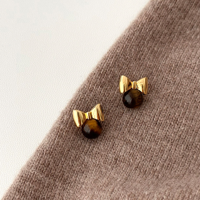 Small sophisticated retro elegant earrings with bow