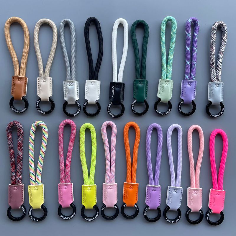 Cross-border high-end bold leather woven mobile phone lanyard car keychain camera anti-lost portable portable short lanyard
