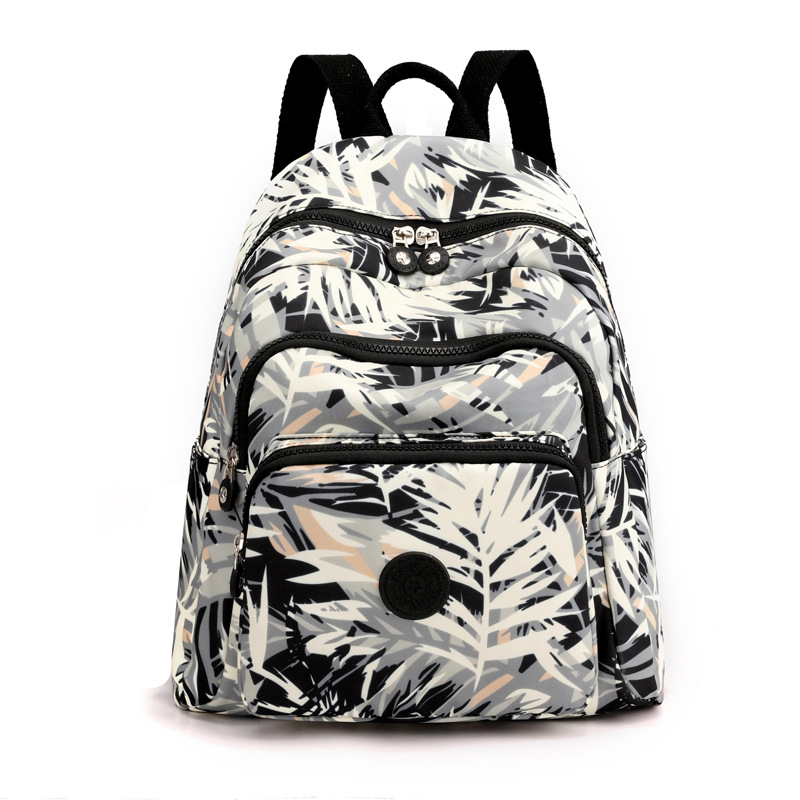 Bolsa de ocio para exteriores, gran capacidad, mochila de viaje versátil de nailon estampada para mujer, mochila de viaje moderna y sencilla