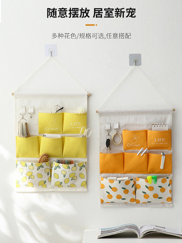 Fabric storage hanging bag bedside wall wall hanging behind the door mobile phone sundries storage pocket wall hanging strong hibiscus