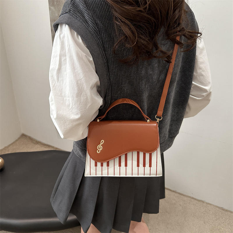 Bolsos de mujer Bolsos cuadrados pequeños de moda Bolsos de mujer Nuevas notas de piano Bolsos de hombro PU Bolsos de mensajero Bolsos de invierno dulce 2024