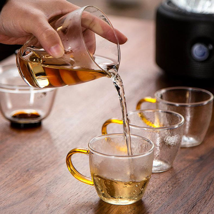 Patrón de martillo de vidrio borosilicato para el hogar taza de té pequeña taza de té con mango taza de té de Kung Fu juego de té sola taza pequeña taza de té