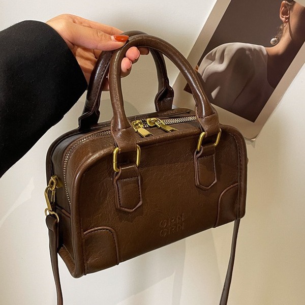 2024 New Maillard Retro Small Pillow Bag Women's Autumn and Winter Trend Korean Handheld Small Square Bag Versatile Crossbody Bag_voghion.com