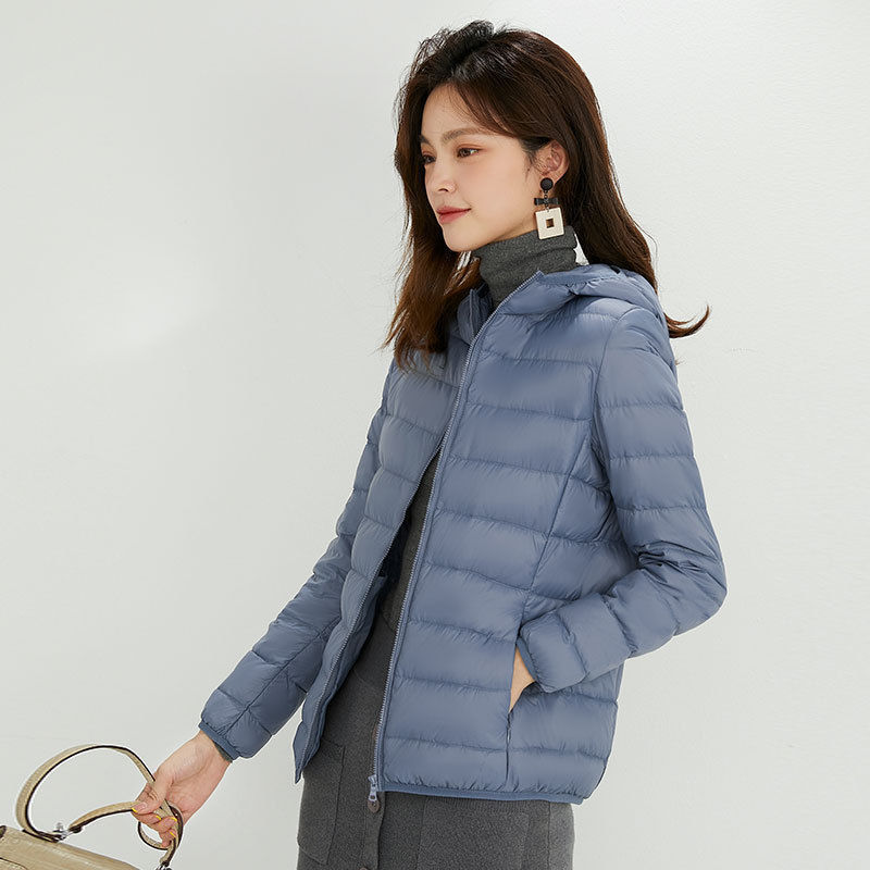 90 chaqueta de plumón de mujer con capuchón ligero corto de tamaño grande ligero estilo extranjero chaqueta de plumón blanco chaqueta Pinghu al por mayor