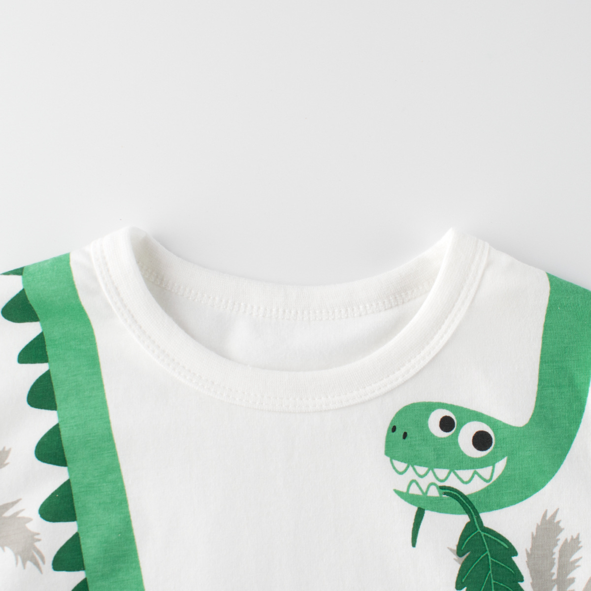 27kids ropa para niños transfronterizos ropa para niños camiseta de manga corta coreana para niños verano nuevo estampado de dibujos animados de dinosaurios