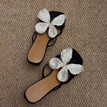 泰国小众蝴蝶结花朵半拖凉鞋2025新款仙女外穿防滑露趾细跟高跟鞋