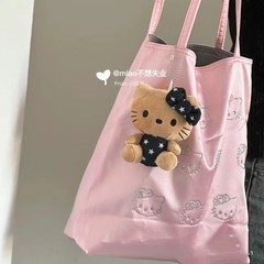 星の黒い皮のハワイのハローキティのカバンは女子学生のカバンktのぬいぐるみの部品を掛けます。