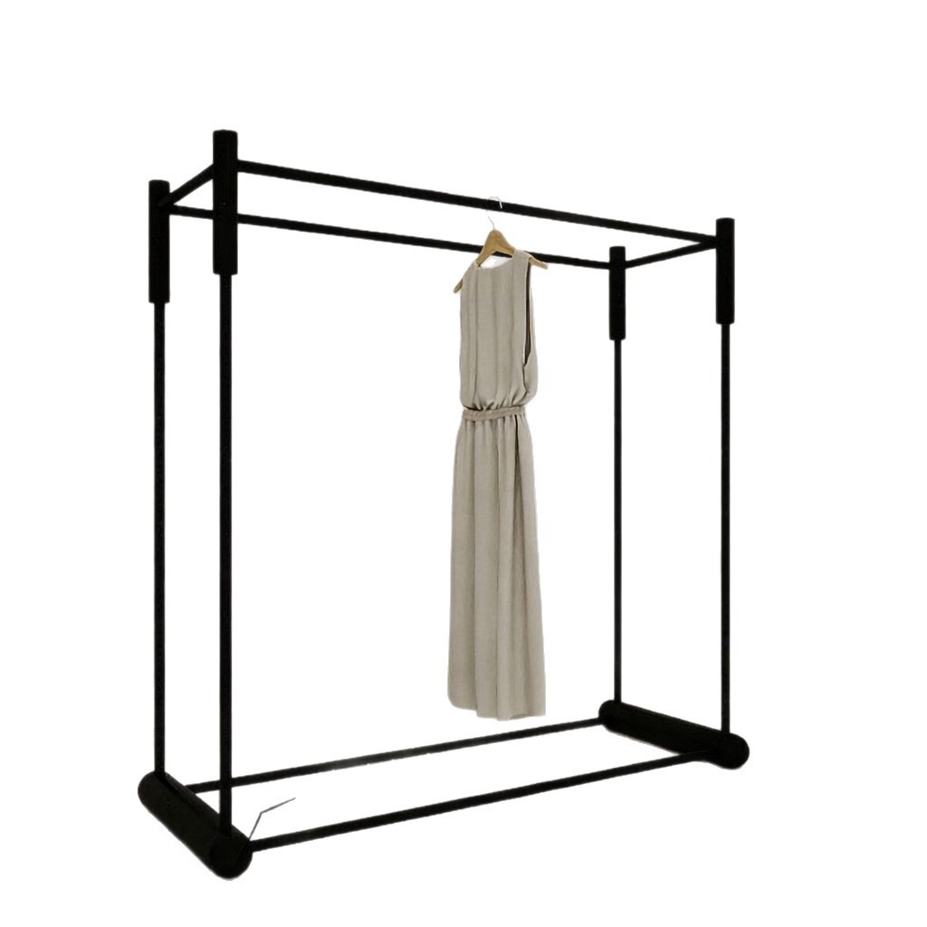 Tienda de ropa de mujer Zhongdao marco negro forjado doble fila estante de piso grueso grueso exhibición de ropa de alto valor de la cara Zhongdao marco