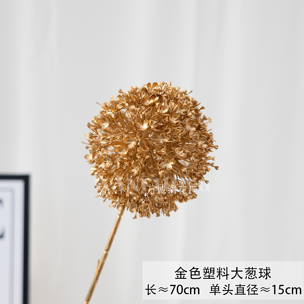 Flores artificiales doradas para Navidad