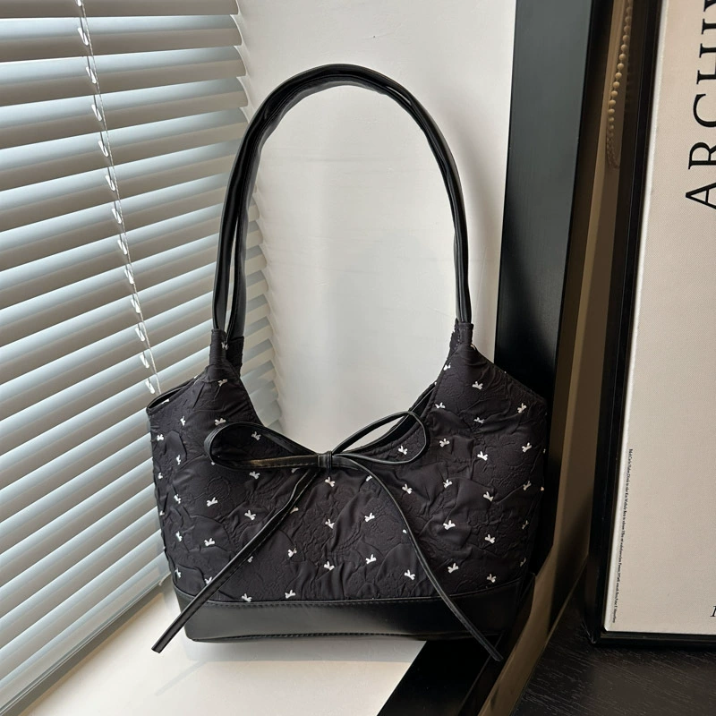 Universal capacious one-shoulder bag with bow