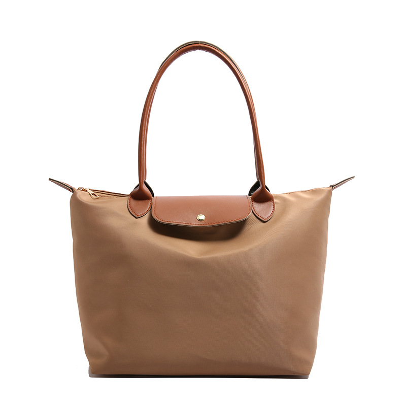 Bolso de hombro casual de gran capacidad para mujer 2025 nuevo bolso de nylon simple costura bolso portátil para axila