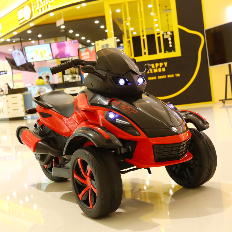 Niños motocicleta eléctrica todoterreno coche de playa carga doble tracción amortiguador coche de juguete de tres ruedas para montar coche eléctrico