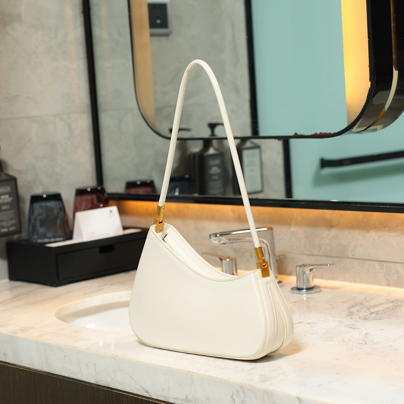 Europa y los Estados Unidos de alta gama retro bolsas de brazo de viaje nicho de alta calidad bolsas de mano de moda versátil de hombro mochila de moda