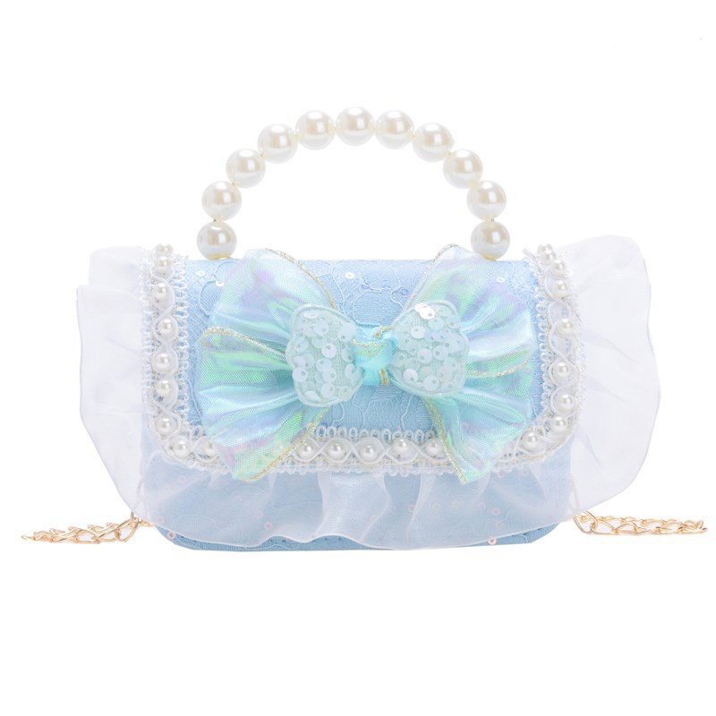 Bolso de perla de fragancia pequeña para niños Bolso de hombro de niña de dibujos animados de moda Bolso de monedero de bebé de todo fósforo con lazo