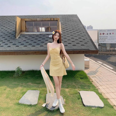 ハニーココの黄色の花のサスペンダーのスカートのスーツの夏の新型はやせているカーディガンの上着のスカートの2つのセットは代行します。
