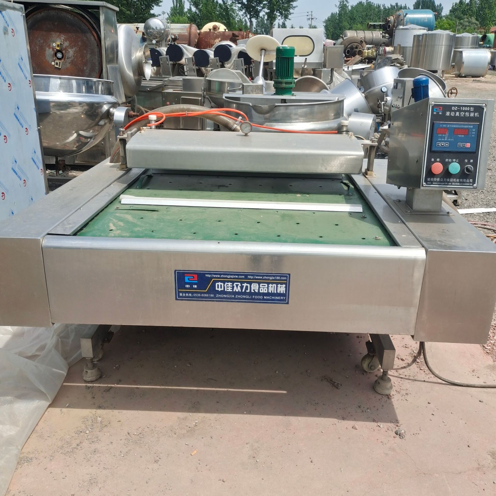 二手1100型全自动连续式滚动真空包装机豆制品卤蛋类鸡爪真空包装