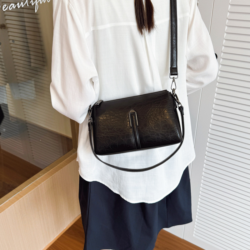 Bolsa de almohada portátil transfronteriza retro bolso de braza para mujeres otoño y invierno 2025 nueva moda bolso de hombro bolso de viaje