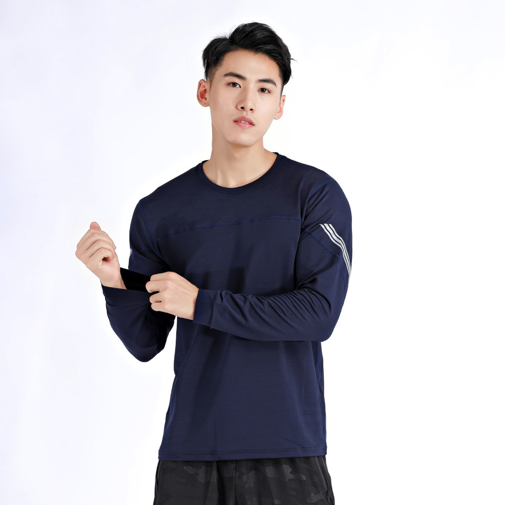 El otoño y el invierno de los hombres de deportes camiseta superior al aire libre de la aptitud de secado rápido de manga larga estiramiento suelto más tamaño en la acción al por mayor A
